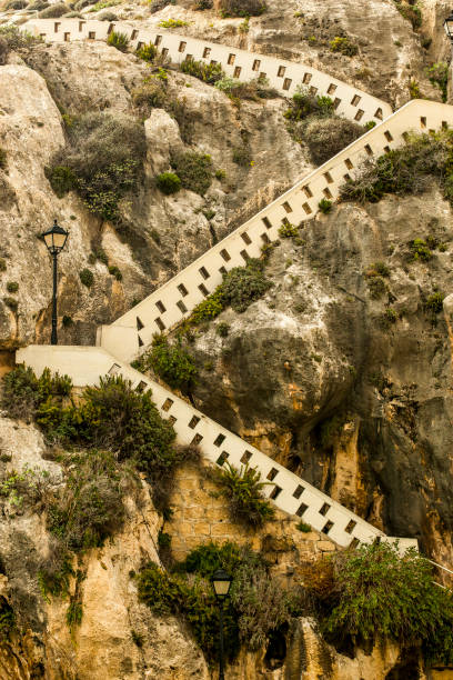 istock Stairs climb the cliff in Gozo 1393776549