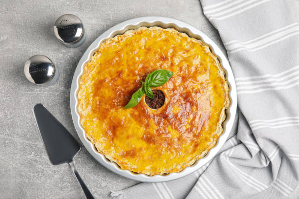 istock Delicious pie with minced meat on light grey table, flat lay 1393776599