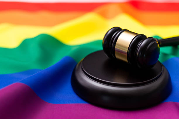 istock Wooden gavel on Rainbow flag 1393776601