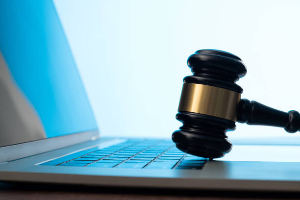 istock Gavel and laptop on the table 1393776813