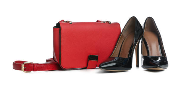 istock Stylish woman's bag and shoes isolated on white 1393778809