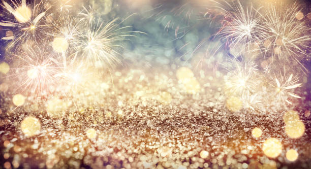 istock Abstract festive background with fireworks, bokeh effect. New Year celebration 1393779743