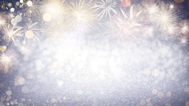 istock Abstract festive background with fireworks, bokeh effect. New Year celebration 1393779766