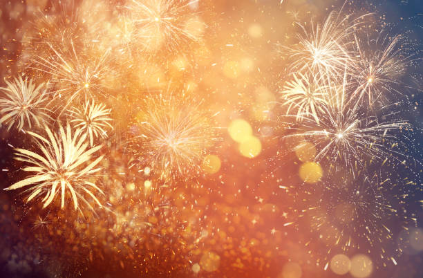 istock Abstract festive background with fireworks, bokeh effect. New Year celebration 1393779867