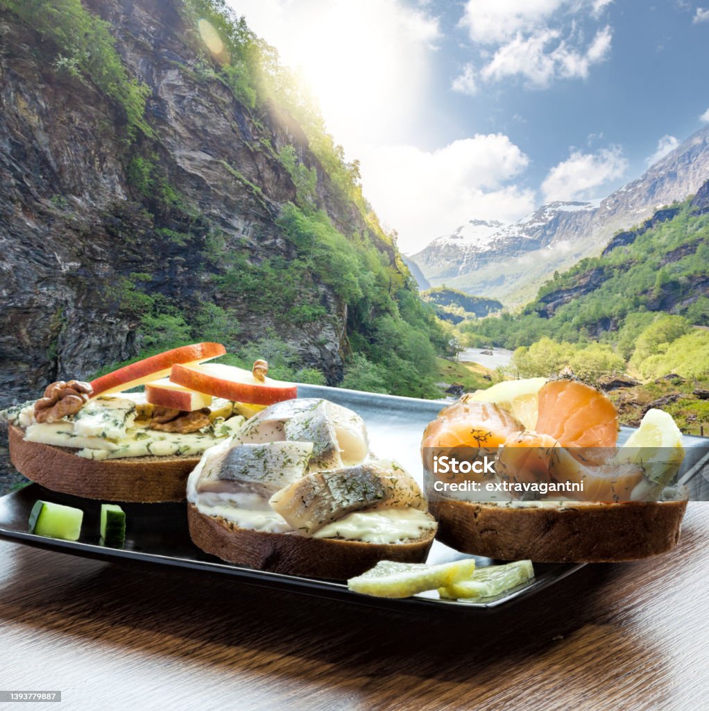 Typical Scandinavian sandwiches against deep walley close the train journey Flamsbana between Flam and Myrdal in Aurland in Western Norway Fishing Stock Photo