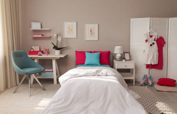 istock Modern teenager's room interior with comfortable bed and workplace 1393780597
