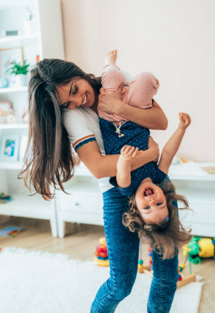 istock Mother and toddler having fun 1393782074