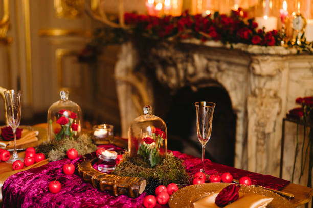 istock Floral compositions and candles on decorated dining table. 1393782257