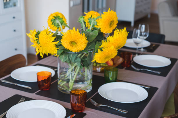 istock Bouquet of sunflowers on the dining table. 1393782343