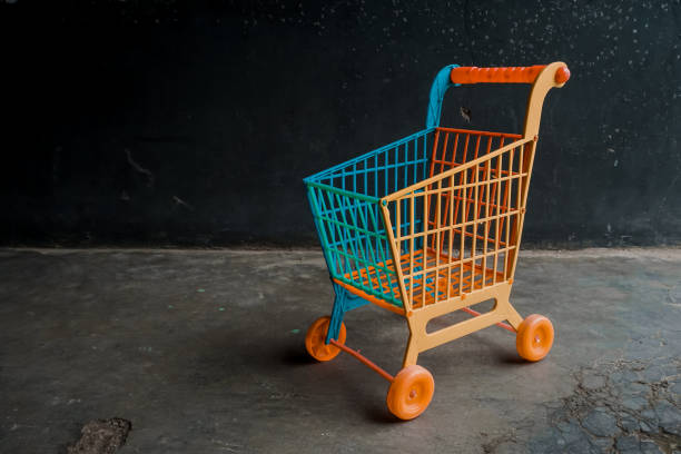 istock Shopping trolley toys 1393784326