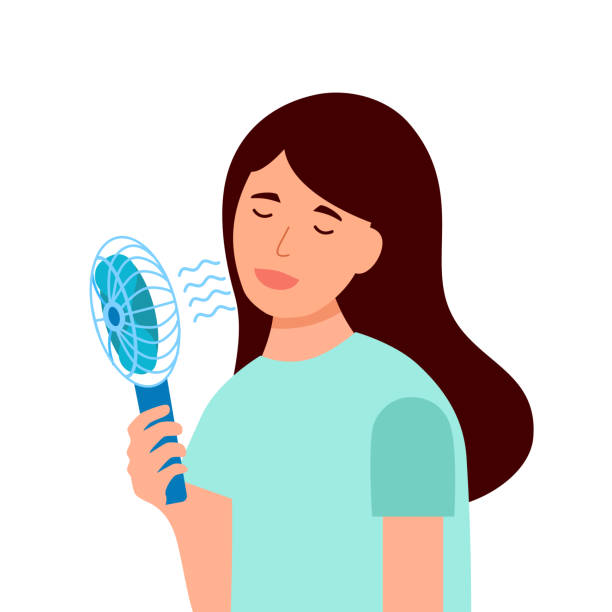 istock Woman holding portable fan blowing her face in flat design. 1393785476