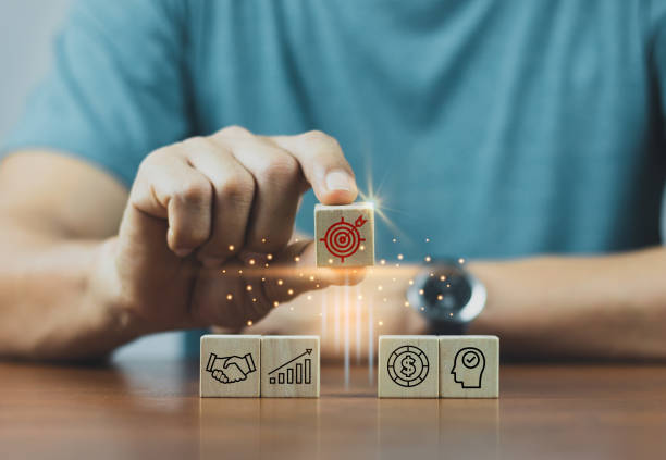 istock Hand arranging wood block stacking with business strategy and Action plan,targeting the business concept.business development concept. 1393785718