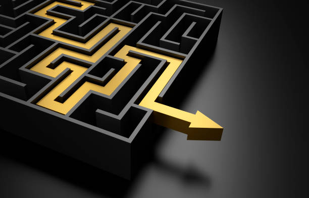 istock Dark maze with golden path 1393786942