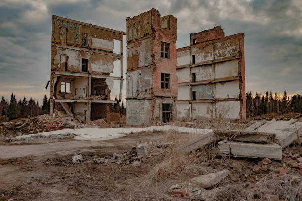 Demolished high rise building against the blue sky. High quality photo