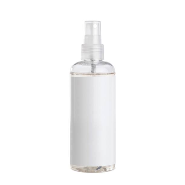 istock Transparent plastic bottle with a sprinkler and a white label for inscriptions. Packaging for various cosmetic and antiseptic products. Convenient modern packaging. 1393788035