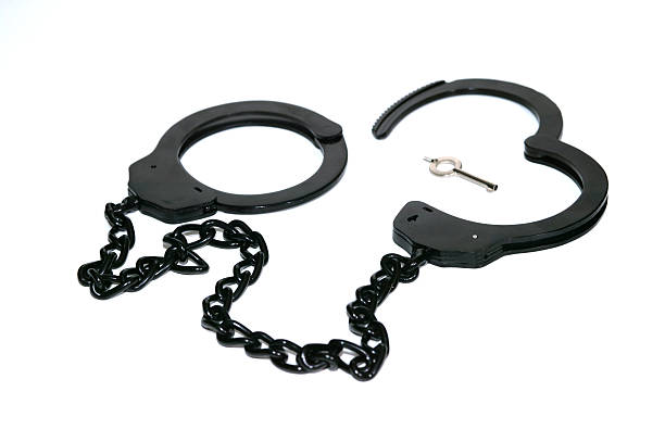 istock Leg irons and key 139378960