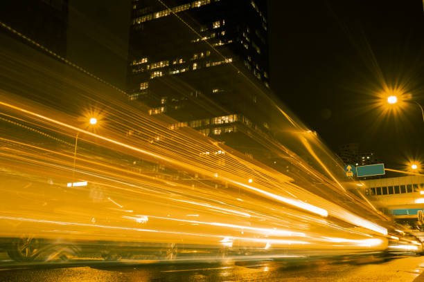 Urban traffic with light trails at night