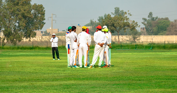 cricket team in match ground
