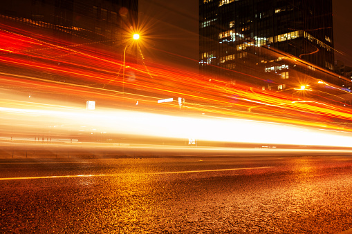 Urban traffic with light trails at night