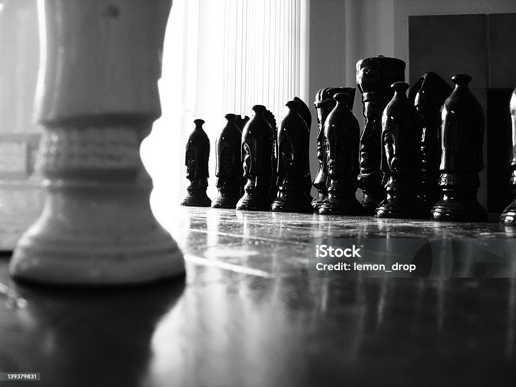 Intimidation Chess set in a natural setting. No piece has been moved yet. Aggression Stock Photo