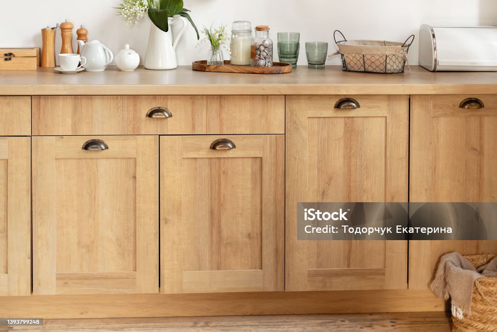 https://media.istockphoto.com/id/1393799248/photo/wooden-cuisine-cabinet-with-clean-dishes-scandinavian-style-kitchen-interior-organization-of.jpg?s=1024x1024&w=is&k=20&c=-YpI4He6_FOM6zibD2T7g02FDEuODjbKL6Xri7GOvYs=