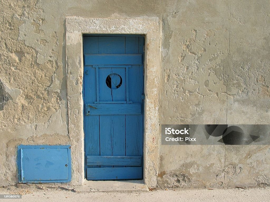 Blue Doors Double door in blue in wall Adobe - Material Stock Photo
