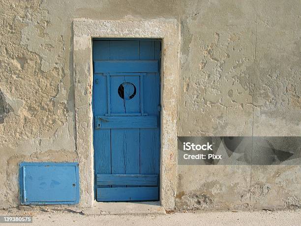 Blue Doors Stock Photo - Download Image Now - Adobe - Material, Architecture, Behind