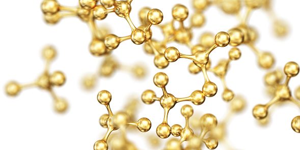Golden oil molecules. Isolated on white background. 3D Render