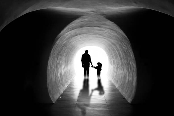 istock Light at the end of tunnel 1393810659