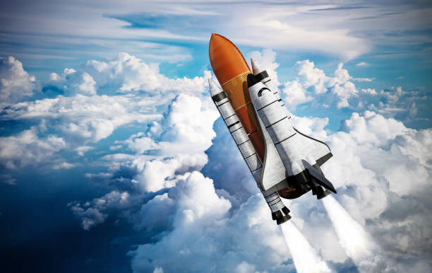 Space shuttle and launch rockets leave the Earth's atmosphere stock photo