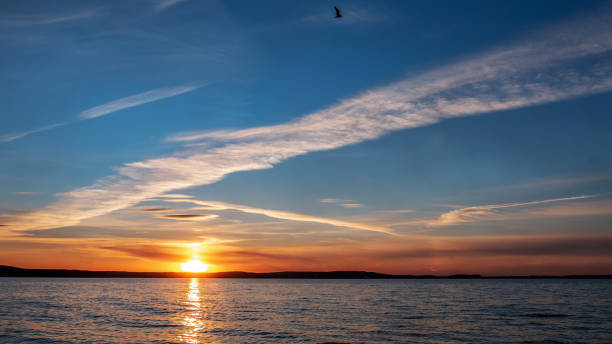 istock A peaceful sunset on the seashore. Rich, warm evening colors 1393812173