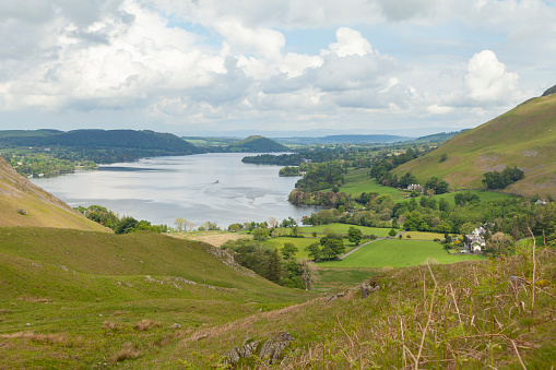 Landscape of mountains and Lake Ullswater, the second largest lake in the Lake District, in the north of England, in the county of Cumbria, UK