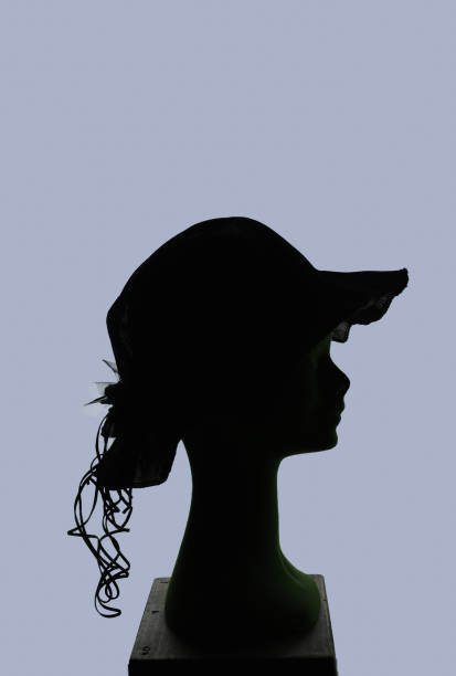 istock mannequin head silhouette profile wearing vintage straw hat 1393812245