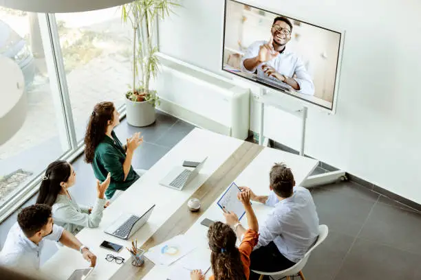 Online video conference webinar meeting in the modern office