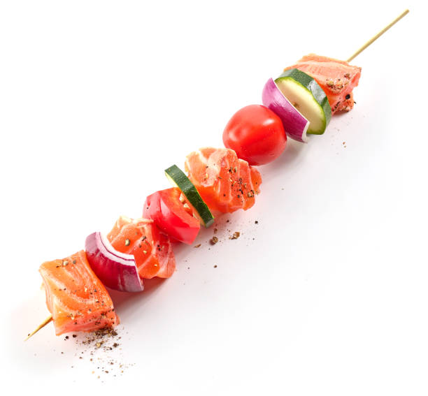 istock raw salmon and vegetable skewer 1393820199