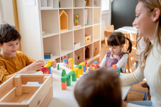 istock Preschool Children Playing Music Using Various Colorful  Instruments 1393822068