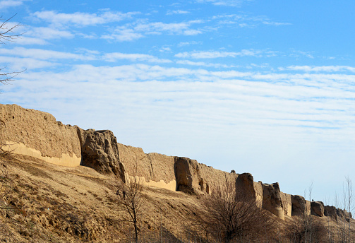 Balkh, Balkh province, Afghanistan: Greek-Kusahn city wall topped by Timurid wall - south segment of the massive earthen city walls from Ayaran tower to Baba Koh gate - Bactra / Zariaspa, an ancient city, with a 3000-year long history, the home of Zoroaster, taken by  Alexander the Great about 330 BC, capital of Greco-Bactria and later one of the largest cities of Khorasan, razed by Ghengis Khan in 1220AD.