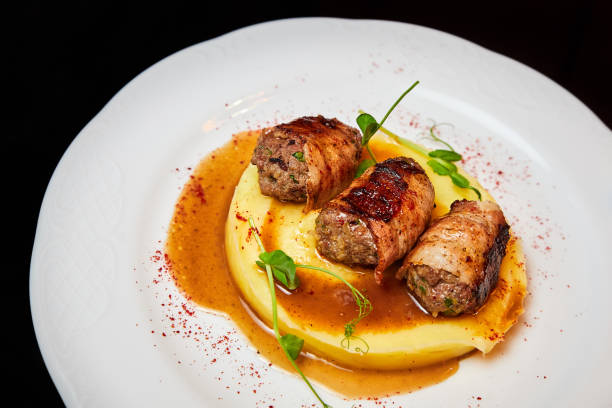 istock Veal kebab in bacon with mashed potatoes. Close-up, selective focus 1393826516