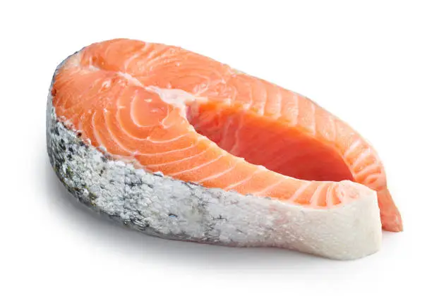 fresh raw salmon steak isolated on white background