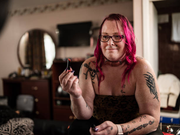istock Transgender person putting her make up on 1393830664