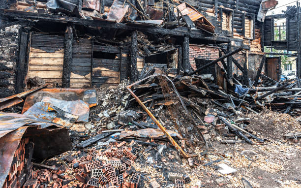 istock Charred ruins and remains of a burned down house 1393834633