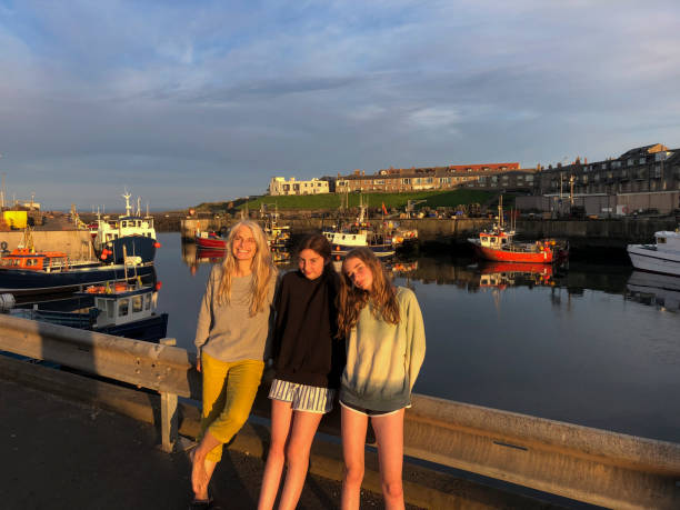 istock Enjoying Golden Hour by the Beach 1393836449