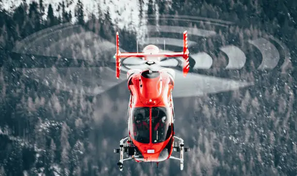 Rescue helicopter in the austrian alpes