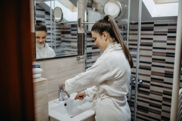 istock Woman is brushing her teeth 1393838923
