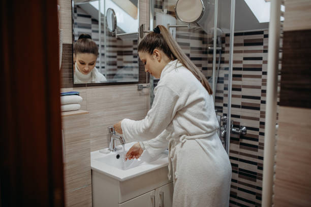 istock Woman is brushing her teeth 1393838950