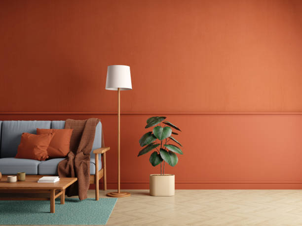 istock Mockup red living room interior with sofa table lamp and copy space.3d rendering 1393839426