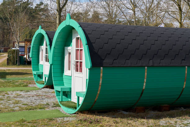 Plötzky, Germany – March 19, 2022: Wooden sleeping barrel to spend the night on a campsite in Germany