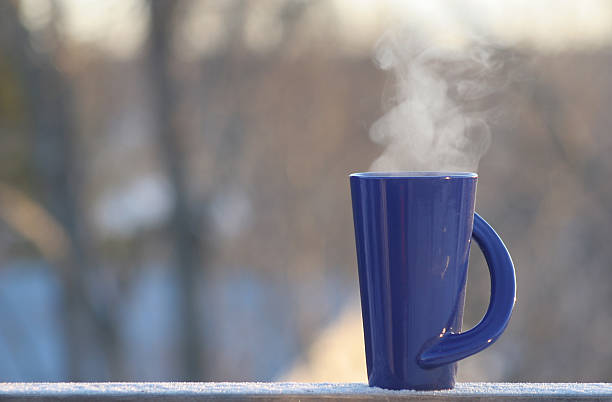 istock A large blue cup of coffee steaming in the cold weather  139384639