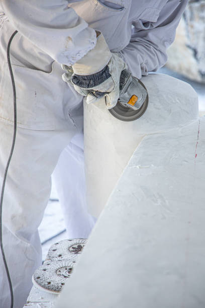 istock artist who works marble with circular saw 1393846633