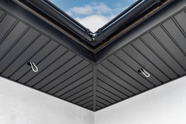 a modern graphite herringbone roof lining is attached to the trusses, visible cables and holes for led lighting. - lead sheet imagens e fotografias de stock